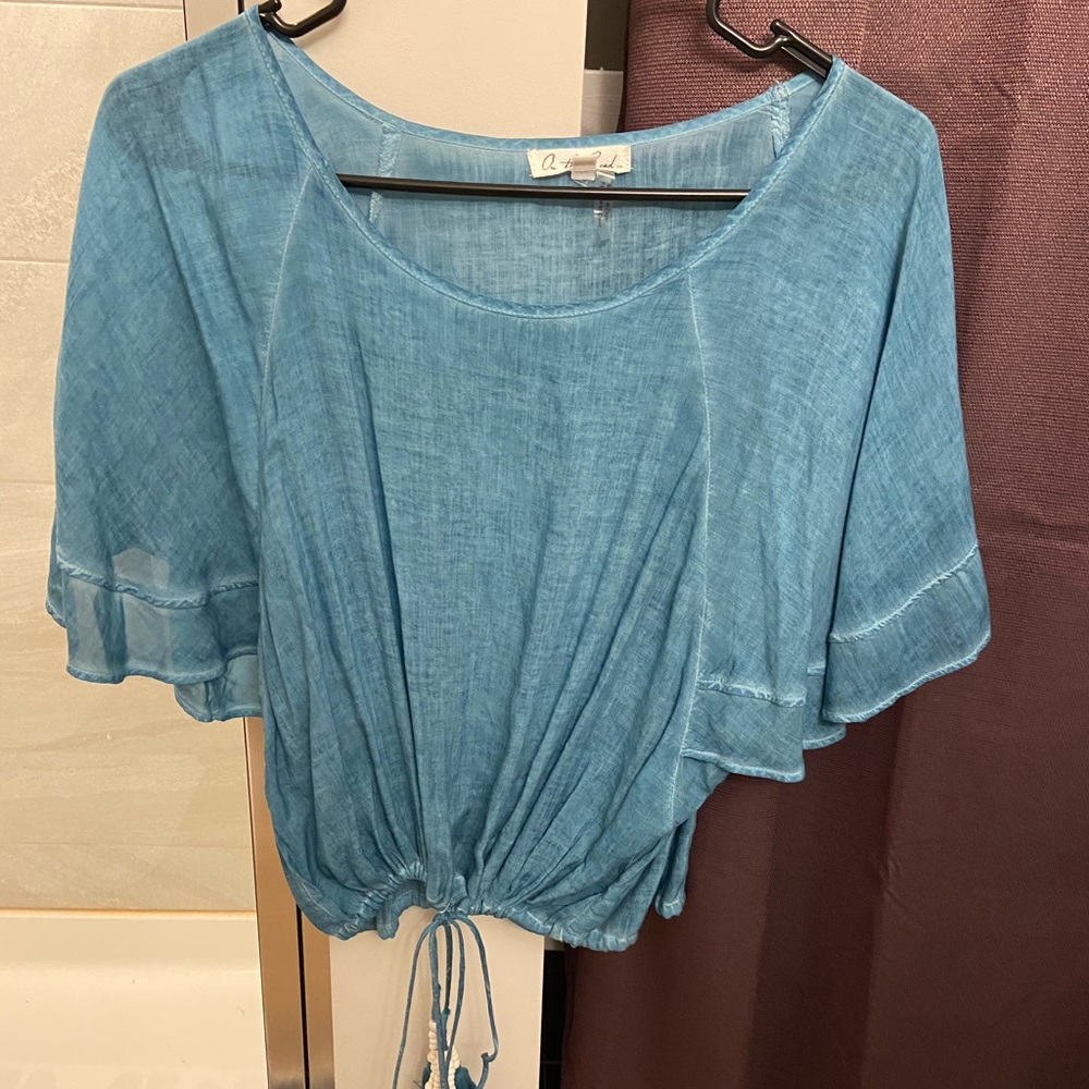 Tie front loose blouse.
